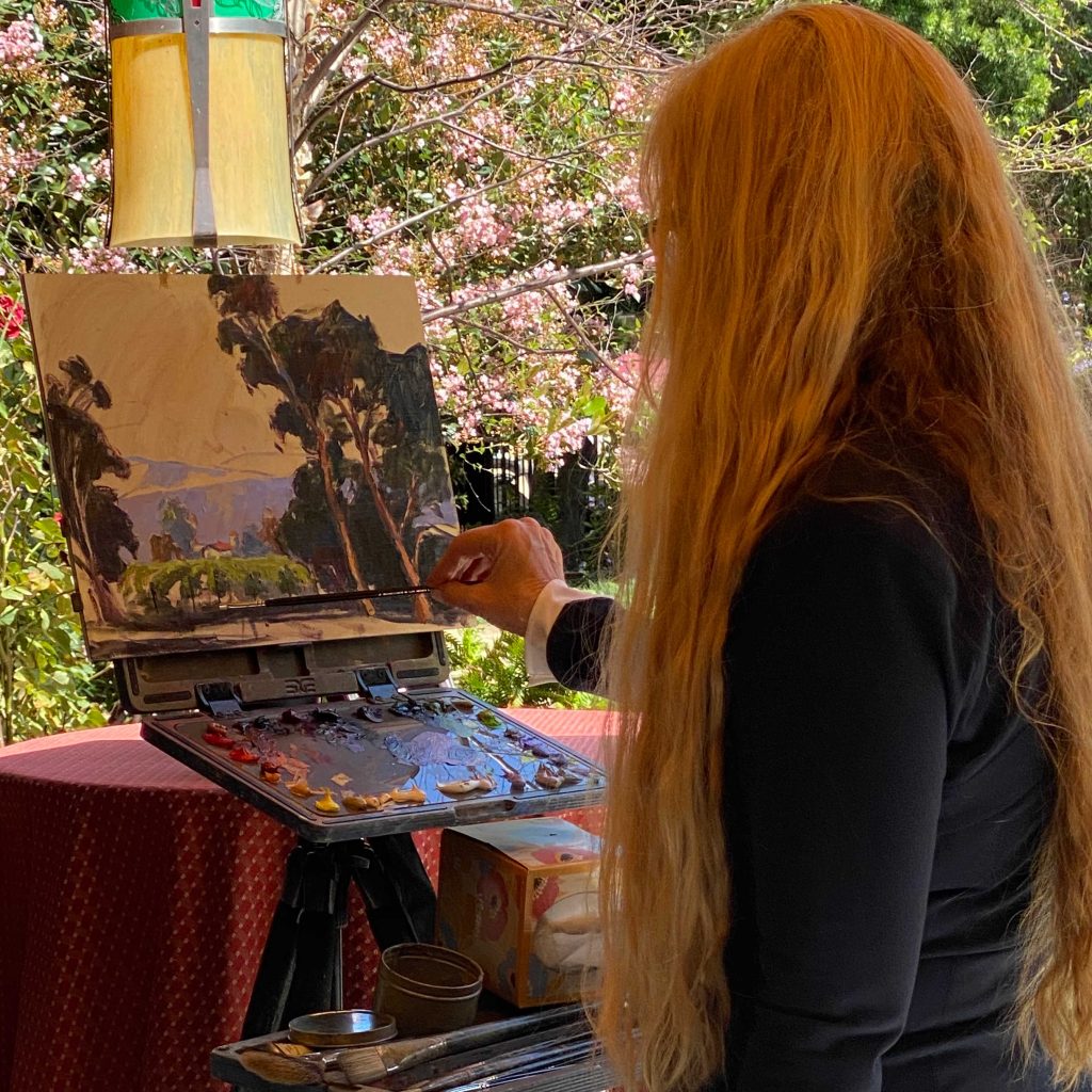LPAPA Signature Artist Debra Huse painting at the Disney Grand Californian