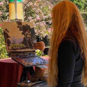 LPAPA Signature Artist Debra Huse painting at the Disney Grand Californian