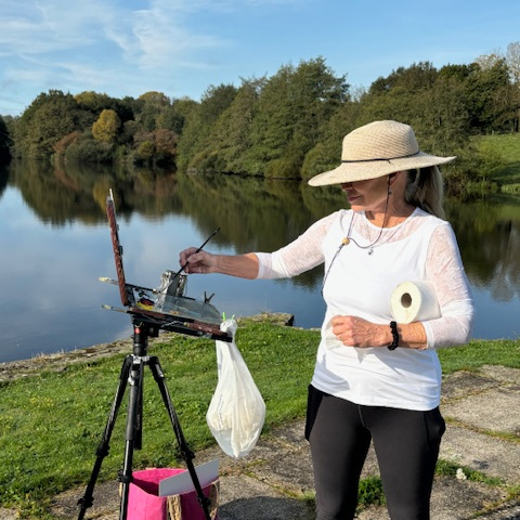 Invitational Artist Mary Garrish at her easel