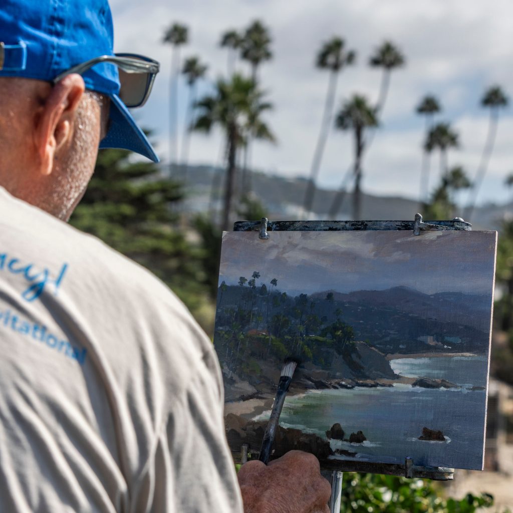 LPAPA Signature Artist Carl Bretzke painting at Heisler Park for the 2025 Laguna Invitation